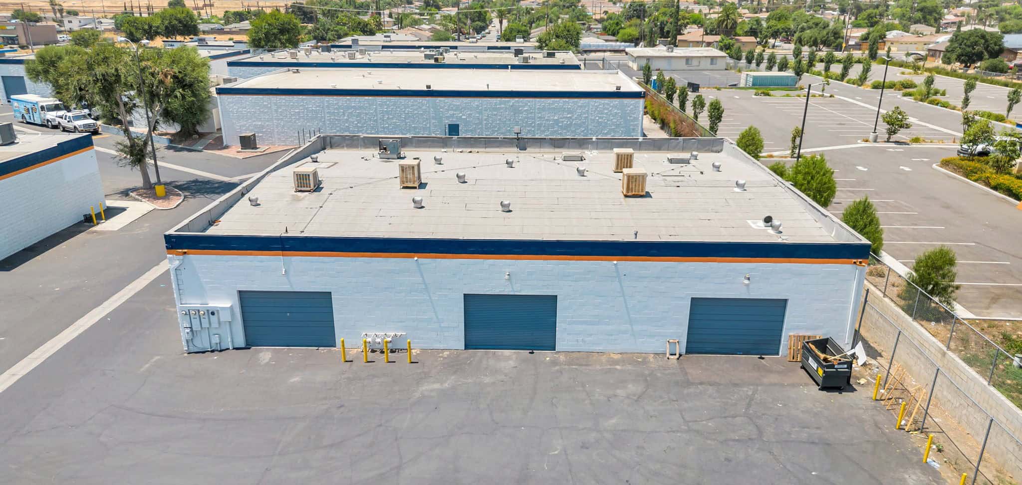 Aerial view of a small bay industrial building at Shadow Rock Commerce Center.
